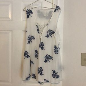 Sadie and Sage romper with blue flowers.